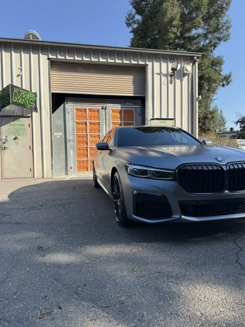 2023 BMW 750i after repair with all-new OEM parts and matched Frozen factory paint