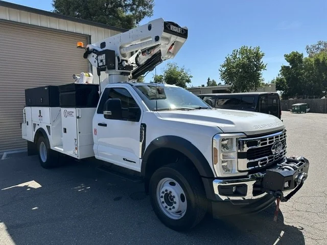 Ford Super Duty boom truck with utility body, repaired at Mike Knight Customs