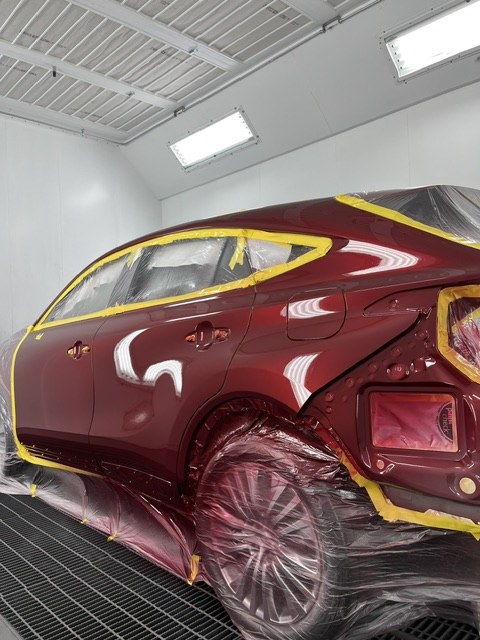 The Venza masked and staged in the spray booth mid-refinish